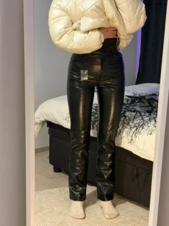 Black faux leather trousers