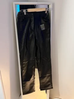 Black faux leather trousers