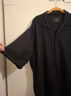 Black short sleeved buttonup loose fit