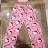 corteiz pink used beanie and new hellow kitty pants