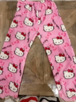 corteiz pink used beanie and new hellow kitty pants