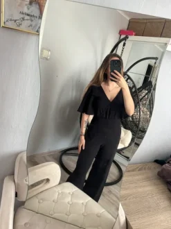 Czarny długi efektowny kombinezon z wycięciem V wow efekt impreza wesele