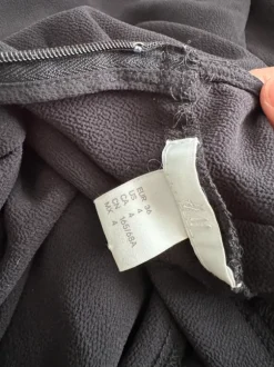 Czarny długi efektowny kombinezon z wycięciem V wow efekt impreza wesele