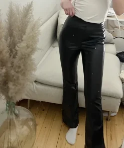 H&m mustat leveälahkeiset keinonahkahousut