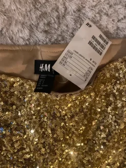 Kultaiset shortsit H&M S