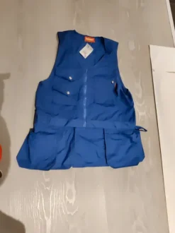 Liivi riipputaskuilla