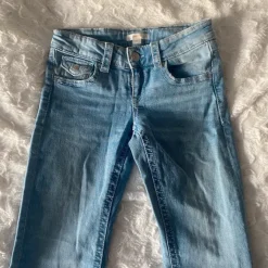 Low Rise Flared Jeans