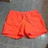 miesten oranssit uimashortsit