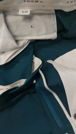 Miesten vihreät prässihousut