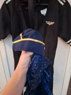 Naisen lentokapteeni naamiaisasu