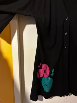 Naisten musta trikoojakku