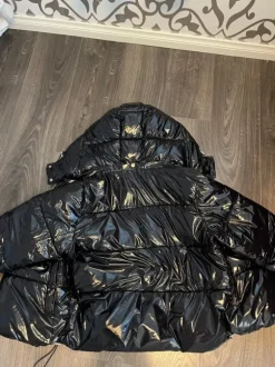 Nellyn musta toppatakki