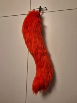 Red fursuit tail