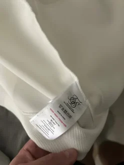 Siksilkin valko/musta verkkatakki.