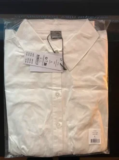 Täysin käyttämätön pitsikuvioitu Kauluspaita