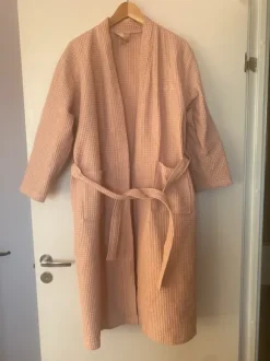 Vaaleanpunainen kypytakki