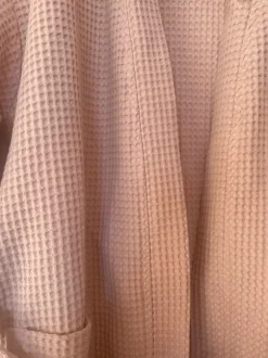 Vaaleanpunainen kypytakki