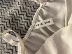 Valkoinen kesätoppi