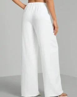 Valkoiset leveälahkeiset kauniit housut