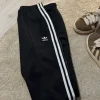 Velour Adidas track pants