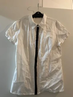 White Orsay shirt with little ribbons.
